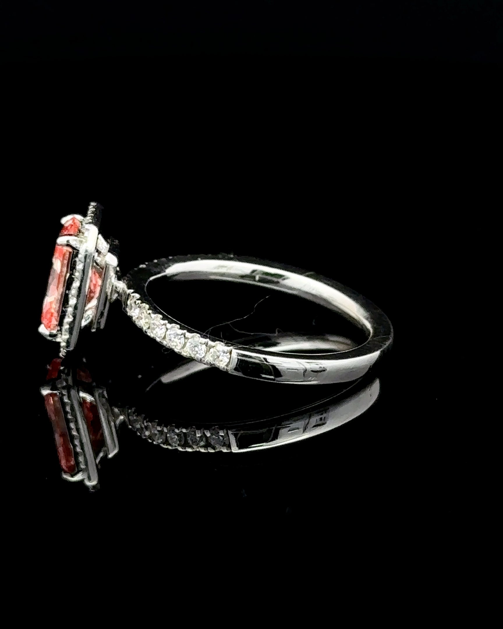 1.71 carat radiant fancy vivid pink halo lab grown diamond statement ring in 14K white gold