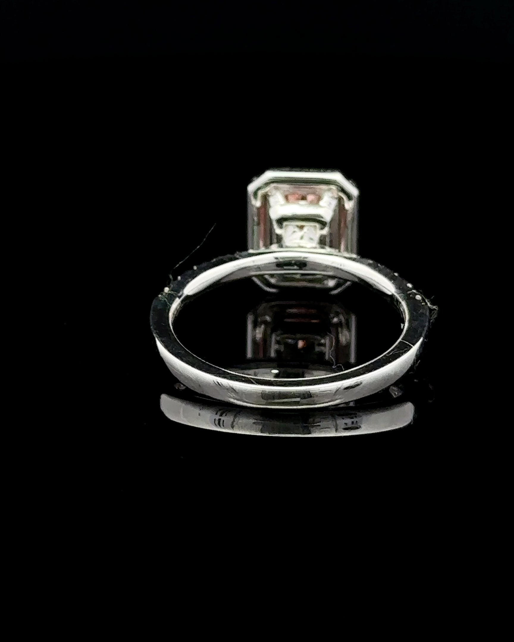 1.71 carat radiant fancy vivid pink halo lab grown diamond statement ring in 14K white gold