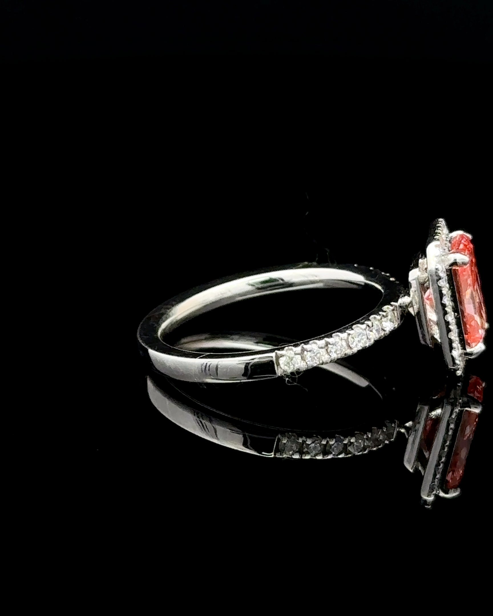 1.71 carat radiant fancy vivid pink halo lab grown diamond statement ring in 14K white gold